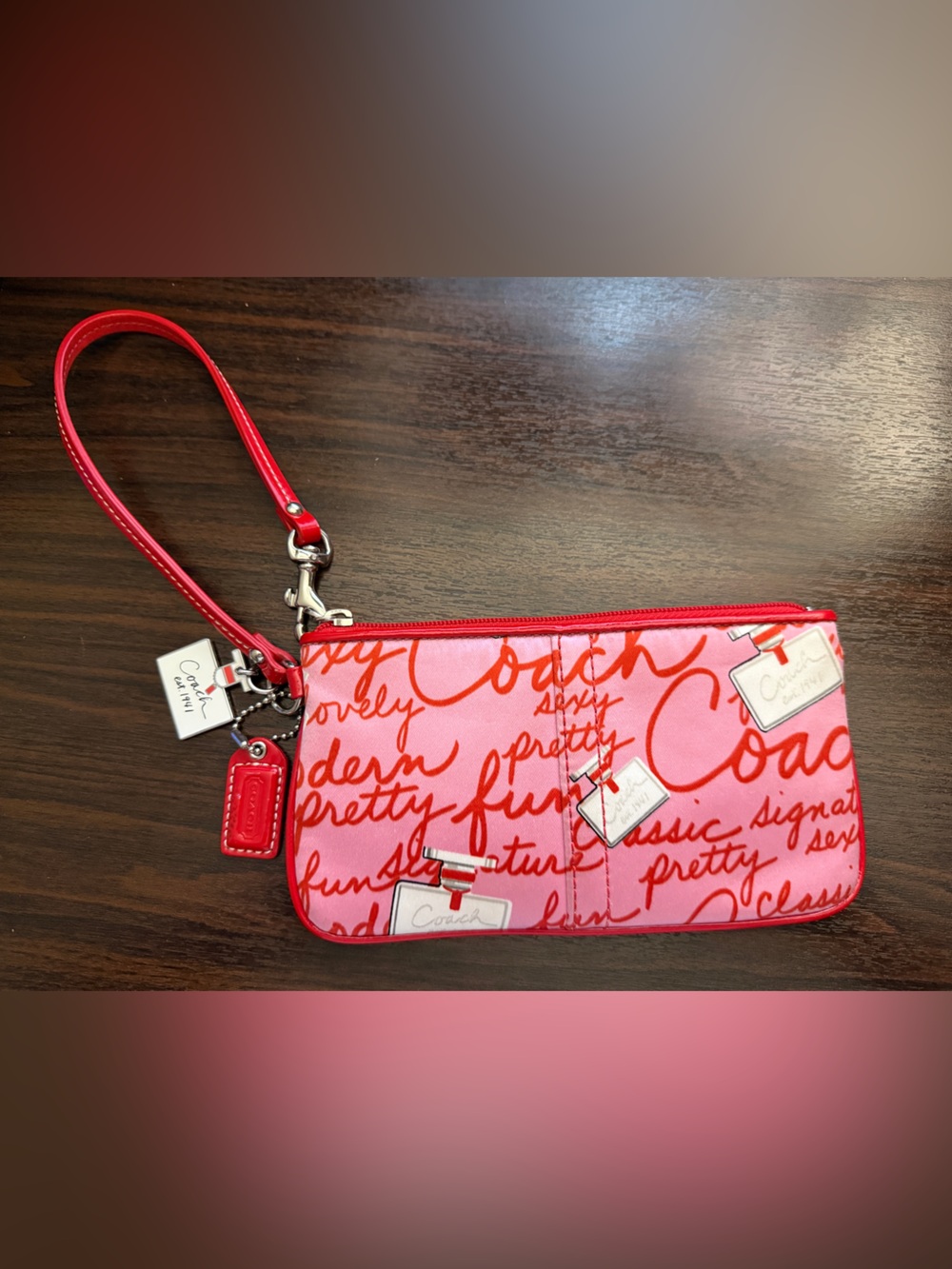 Coach Pink and Red Script Wristlet